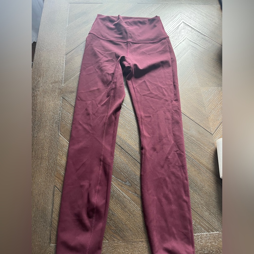 lululemon size 4, maroon, 25 inch, wunder trains, new, never worn